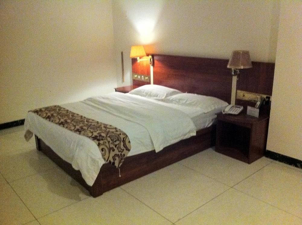 Guoxing Business Hotel Zhaoqing Bagian luar foto
