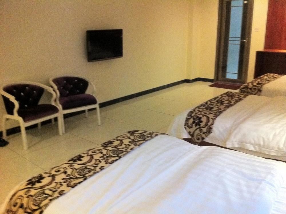 Guoxing Business Hotel Zhaoqing Bagian luar foto