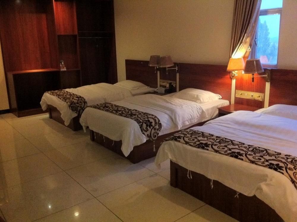 Guoxing Business Hotel Zhaoqing Bagian luar foto