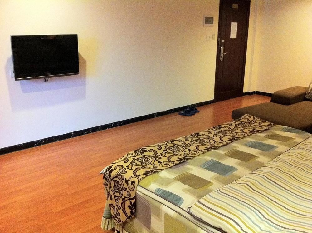 Guoxing Business Hotel Zhaoqing Bagian luar foto