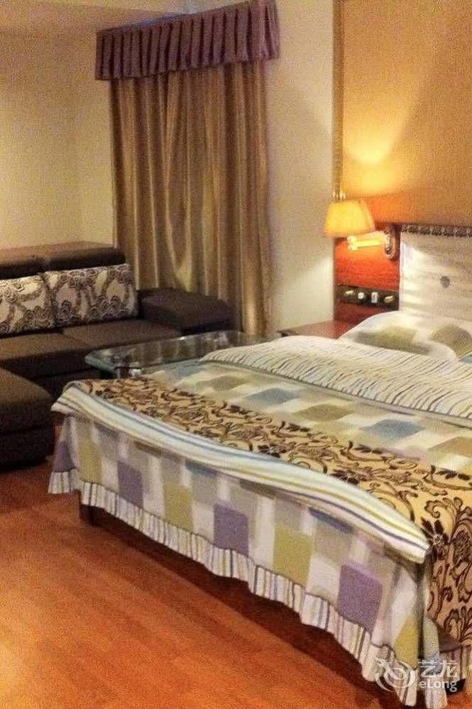 Guoxing Business Hotel Zhaoqing Bagian luar foto