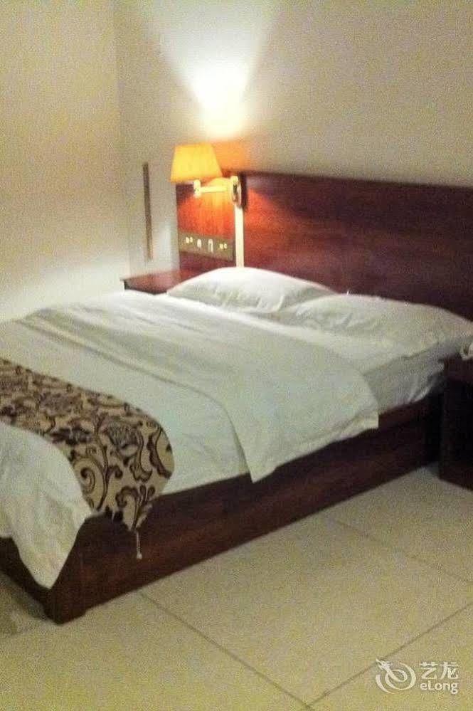 Guoxing Business Hotel Zhaoqing Bagian luar foto