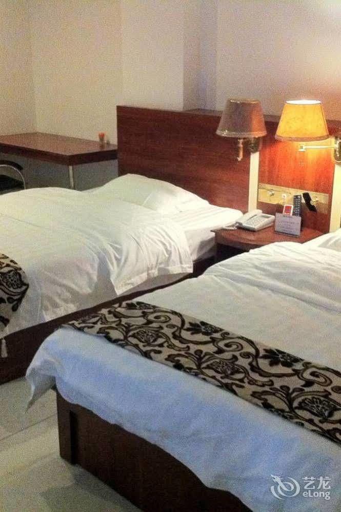 Guoxing Business Hotel Zhaoqing Bagian luar foto