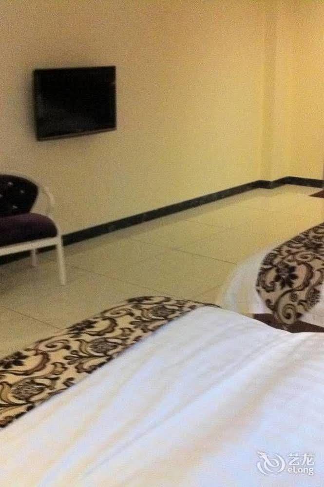 Guoxing Business Hotel Zhaoqing Bagian luar foto