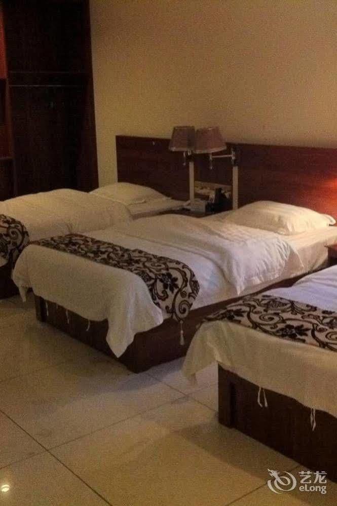 Guoxing Business Hotel Zhaoqing Bagian luar foto